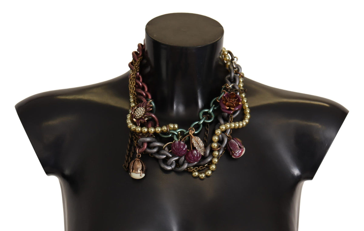 Collier doré en laiton avec motifs floraux siciliens et cristaux.