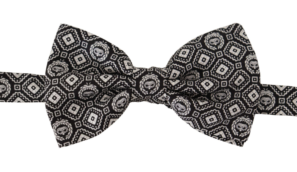 Cravate papillon noire et blanche en 100% soie, taille réglable.