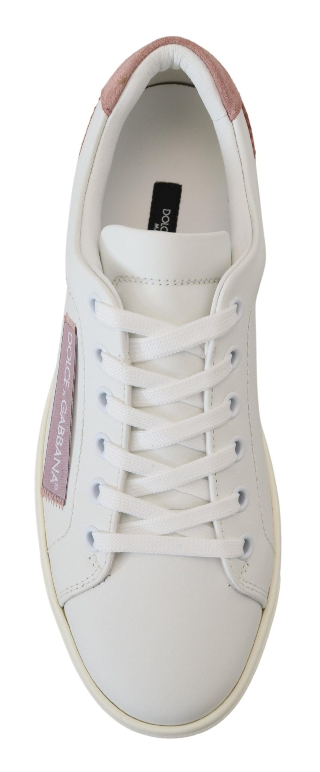 Sneakers basses en cuir blanc et rose.