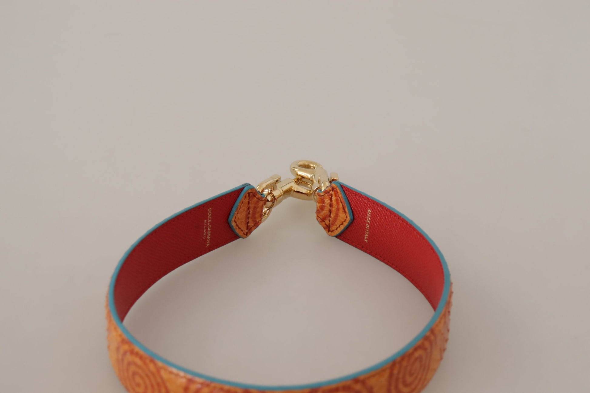 Bandoulière de sac à main en cuir orange à motif tourbillonnant
