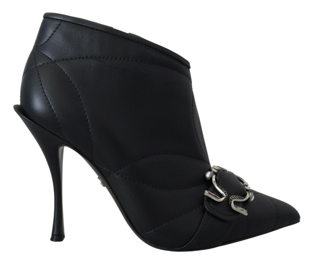 Bottes courtes noires en cuir capitonné avec boucle