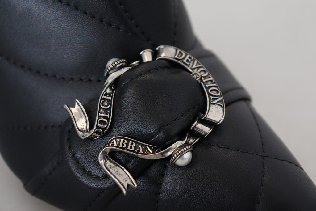 Bottes courtes noires en cuir capitonné avec boucle