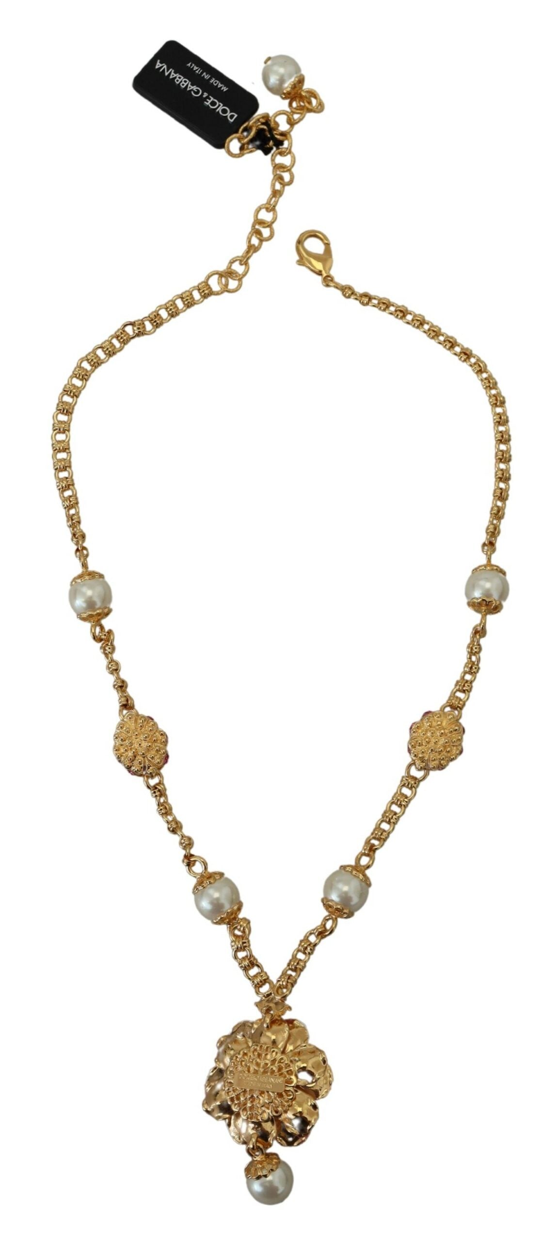 Collier doré à motifs floraux, ornements roses et cristaux.