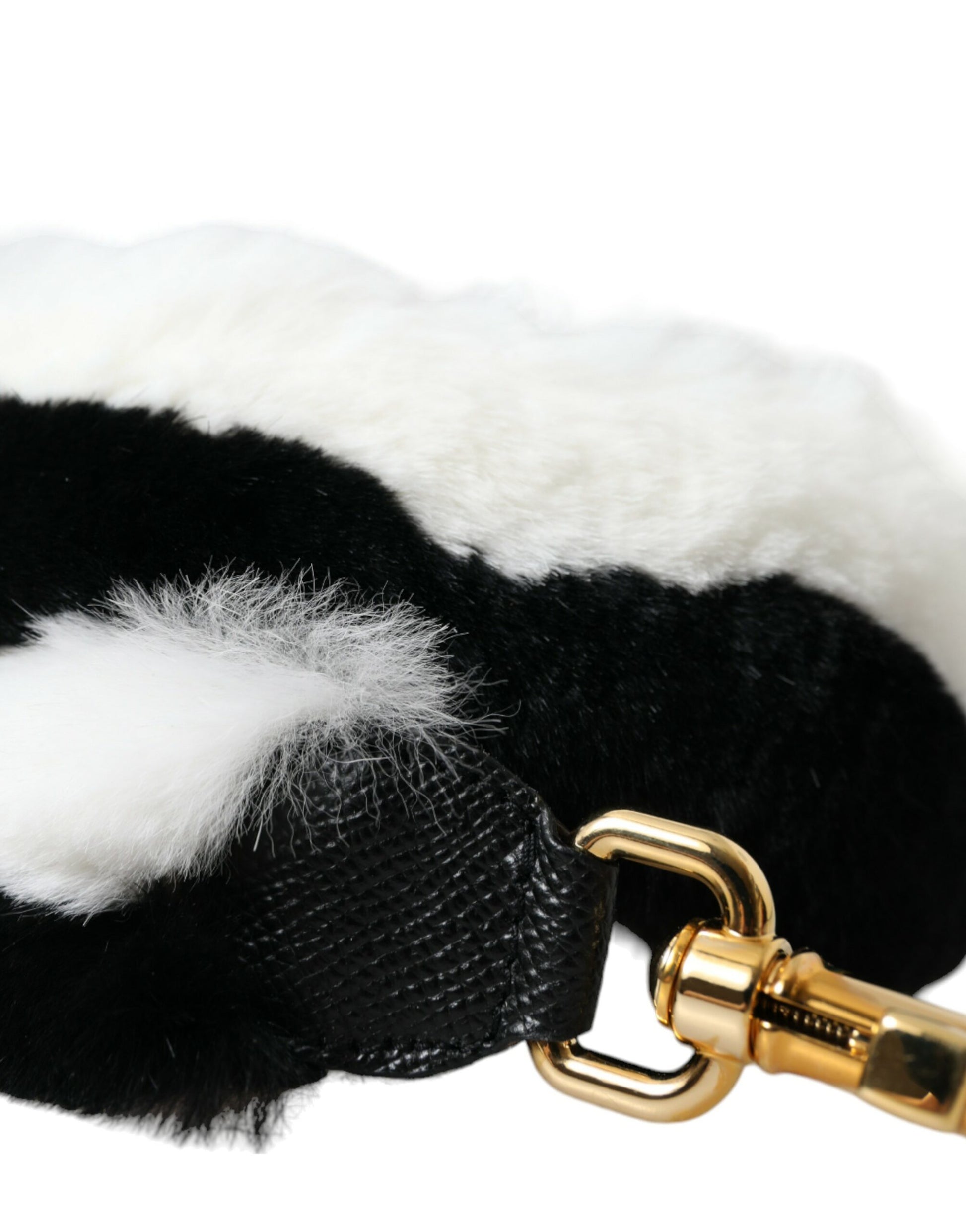 Bandoulière d'accessoire en fourrure de lapin noir et blanc.