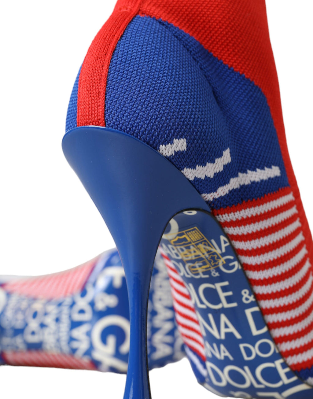 Bottes de cheville en forme de chaussettes extensibles rouges et bleues avec logo.