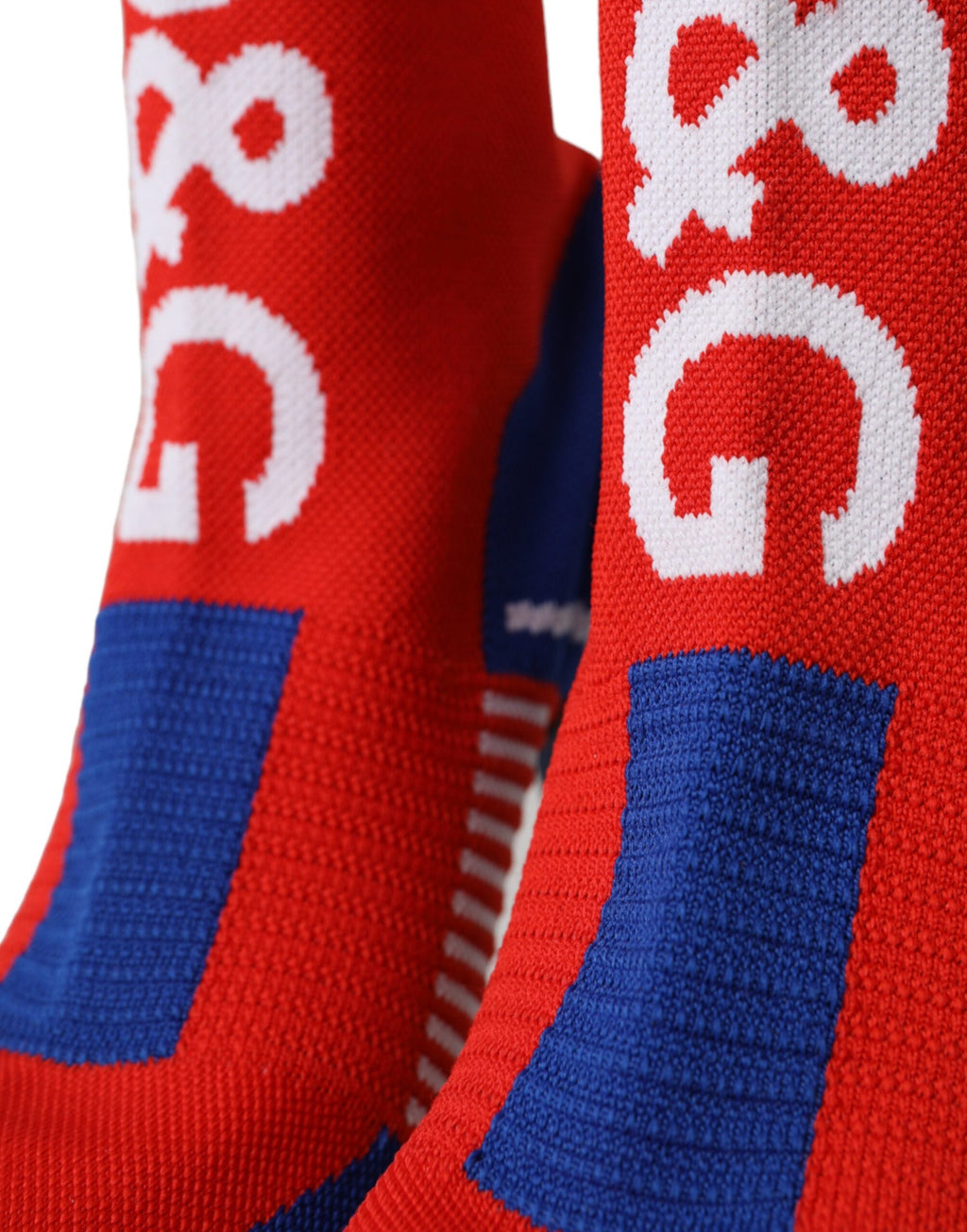 Bottes courtes en forme de chaussettes, rouges et bleues, extensibles, avec logo.
