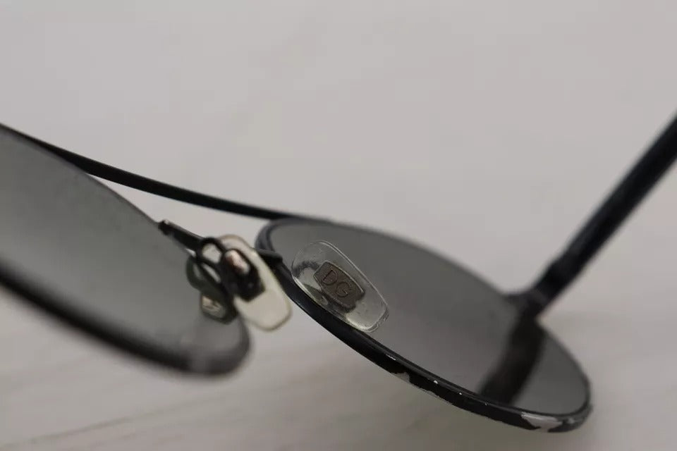 Lunettes de soleil DG2245 avec monture en acier noir mat et verres verts.