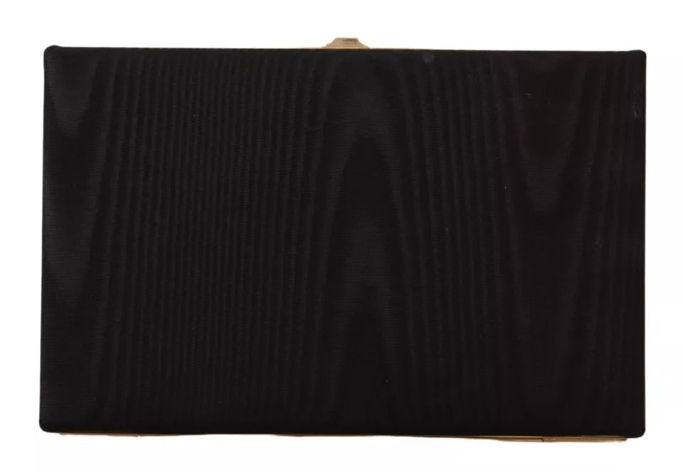 Sac à main de soirée, pochette en soie noire avec cadre doré.