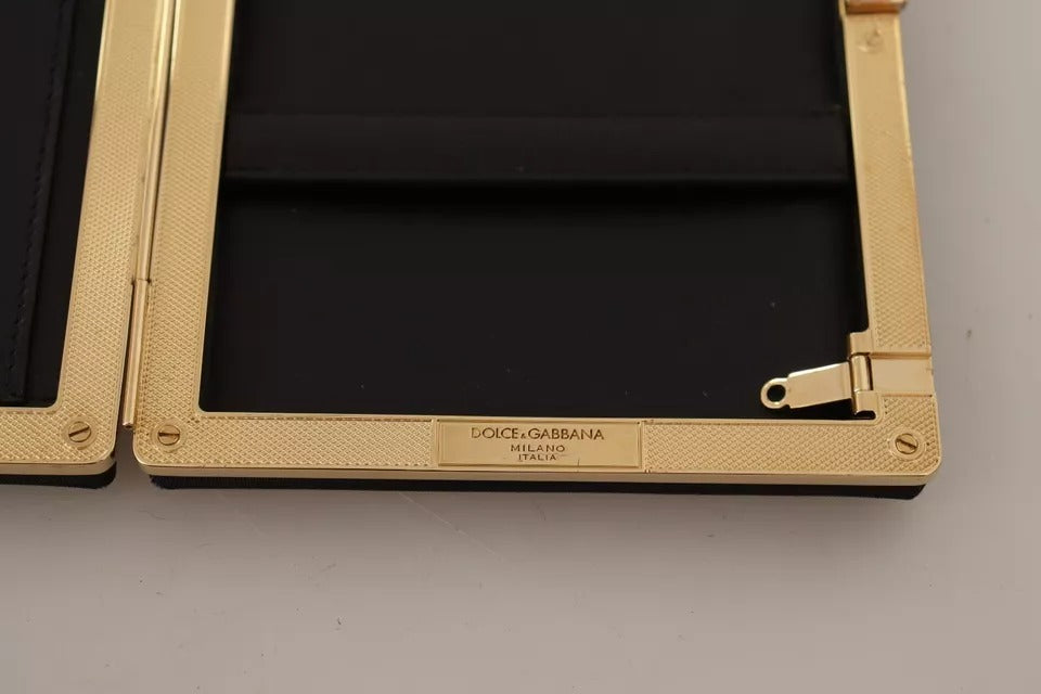 Sac à main de soirée, pochette en soie noire avec cadre doré.