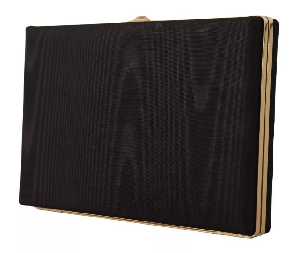 Sac à main de soirée, pochette en soie noire avec cadre doré.