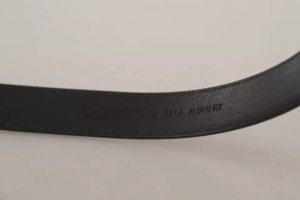 Ceinture en cuir de veau noir avec boucle vintage en métal et logo.