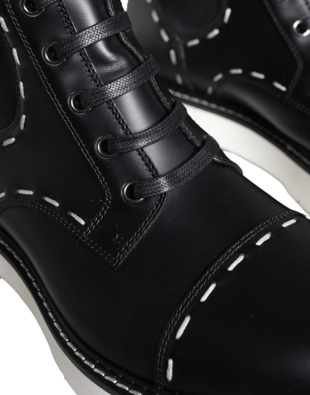 Bottines de combat en cuir noir mi-mollet