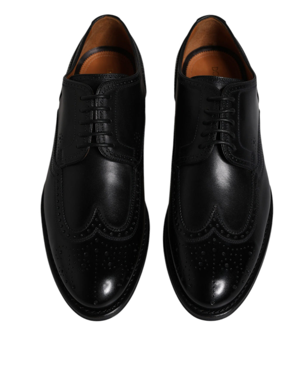 Chaussures habillées en cuir noir, style derby à bout pointu.