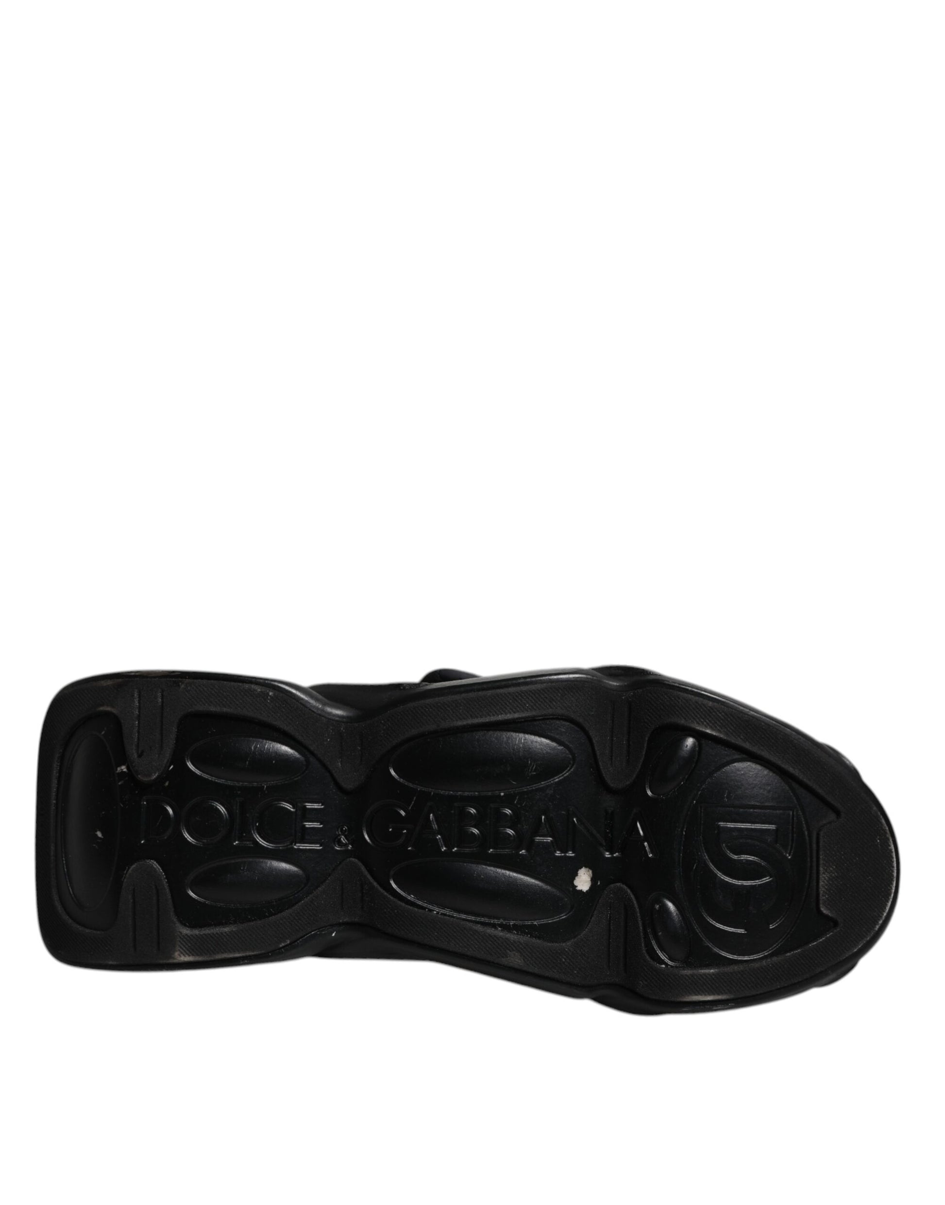 Sneakers plates noires à motif ondulé et matelassé