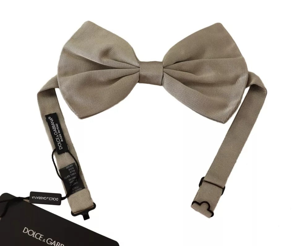 Papillon de cravate réglable en soie 100% argenté gris.