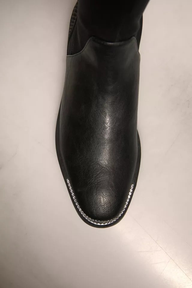 Bottines plates en cuir et daim noir