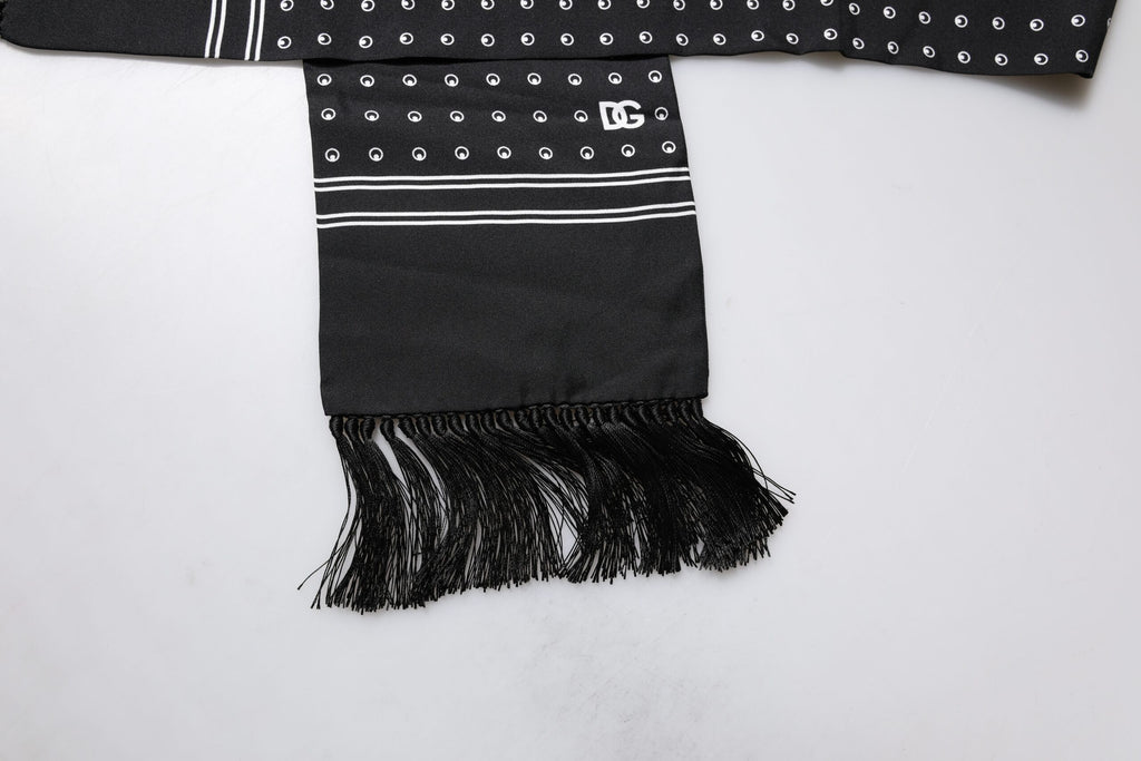 Écharpe fine en soie à pois noirs et blancs avec franges.