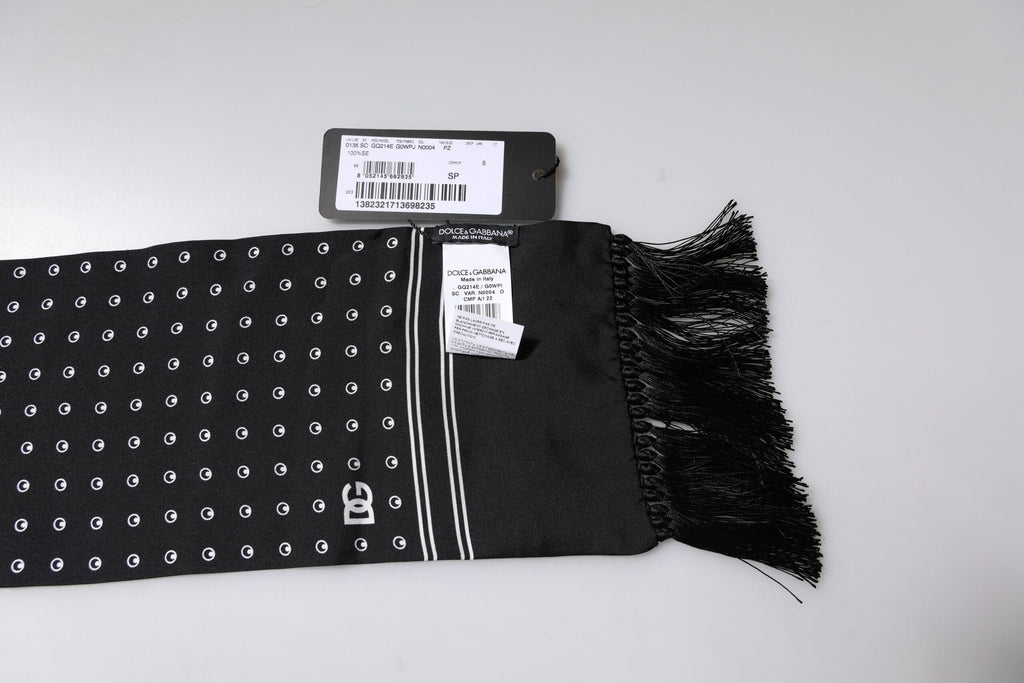 Écharpe fine en soie à pois noirs et blancs avec franges.