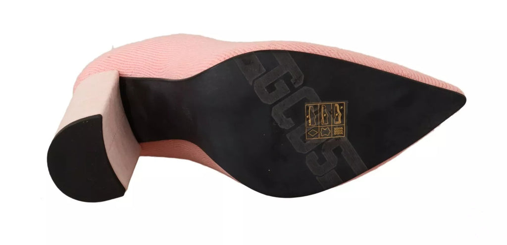 Bottines à talons compensés en daim rose avec logo et chaussettes intégrées.