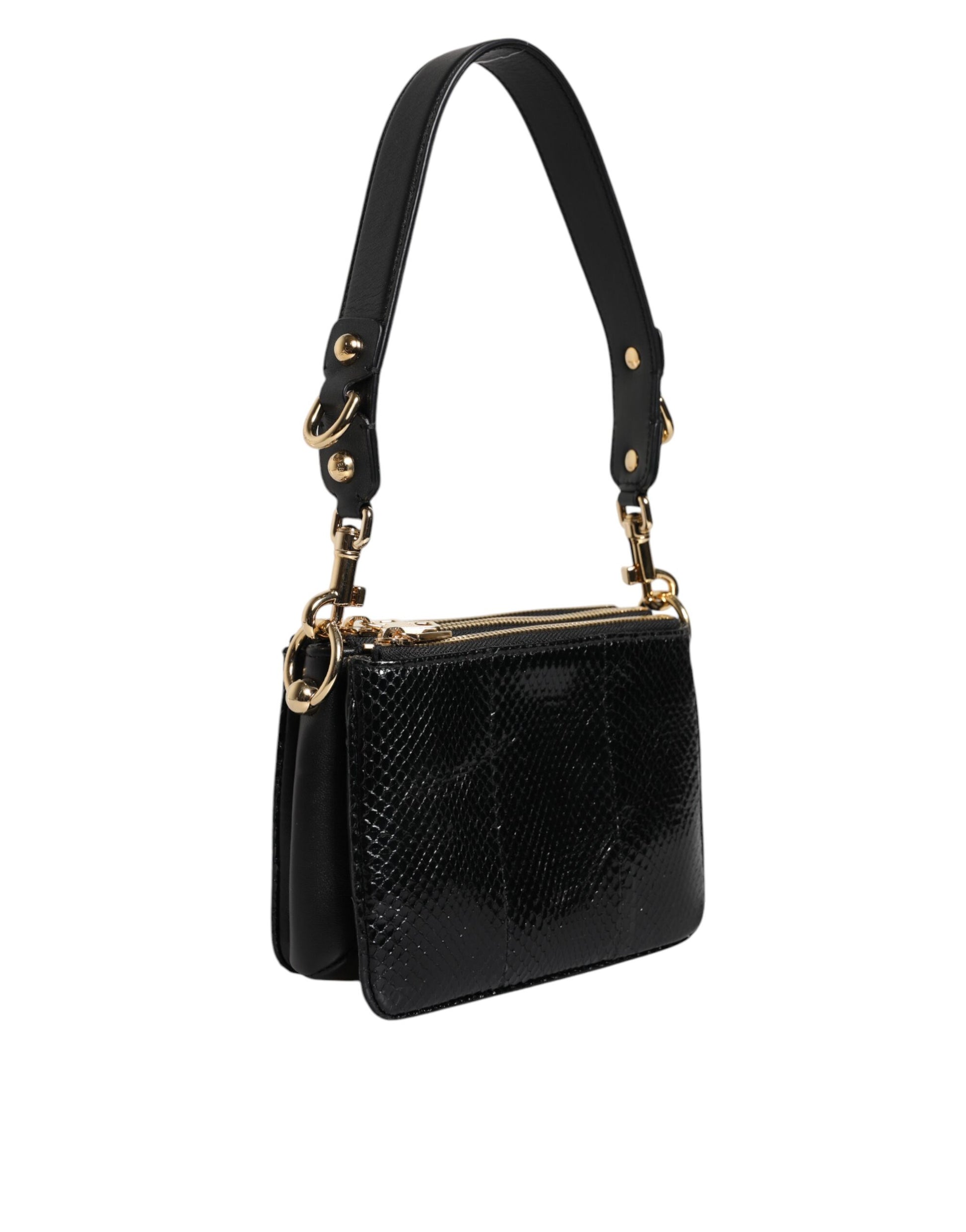 Sac à main porté épaule ou porté à la main en cuir exotique noir.