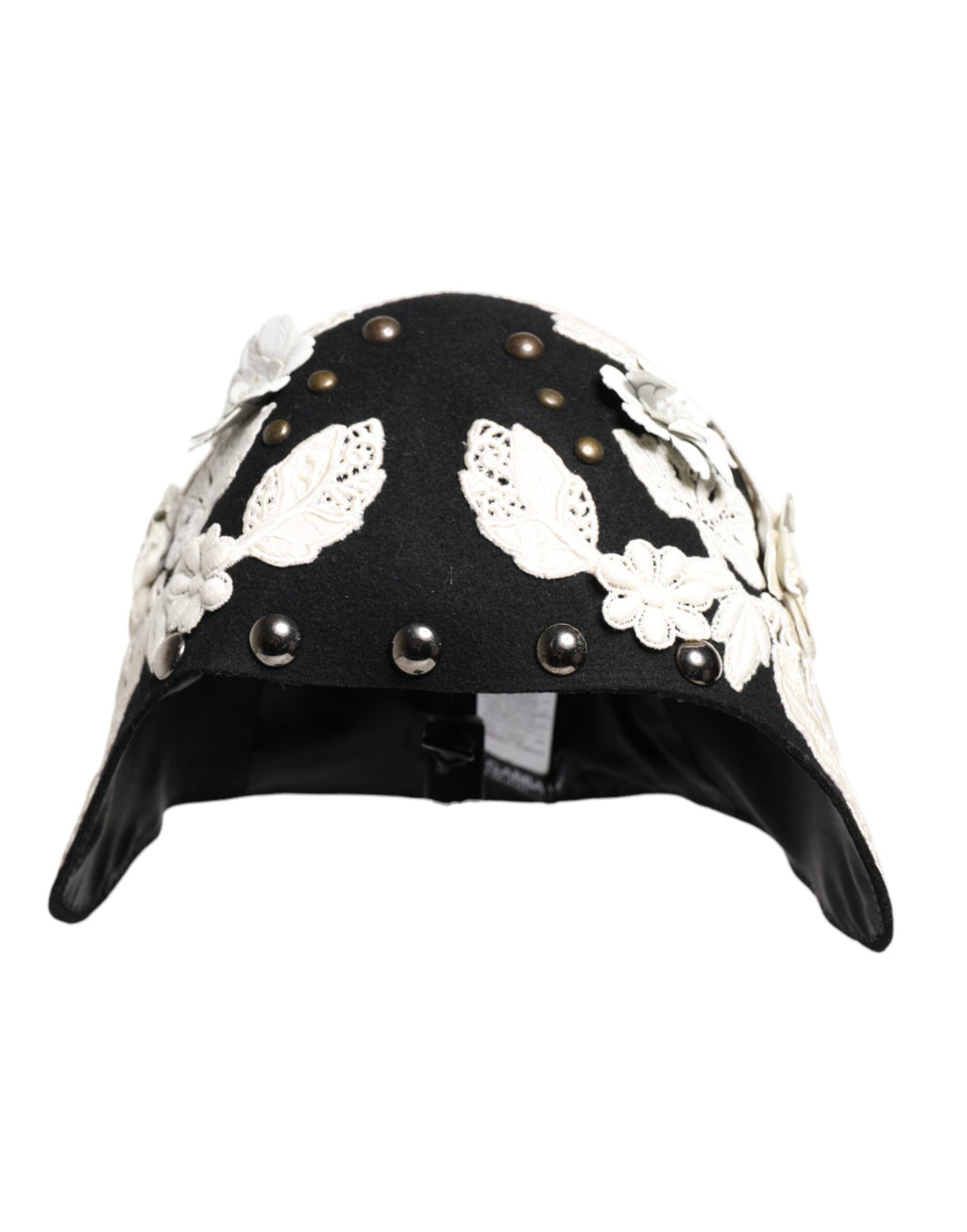 Chapeau cloche en laine noire avec motifs floraux blancs et feuilles d'or.