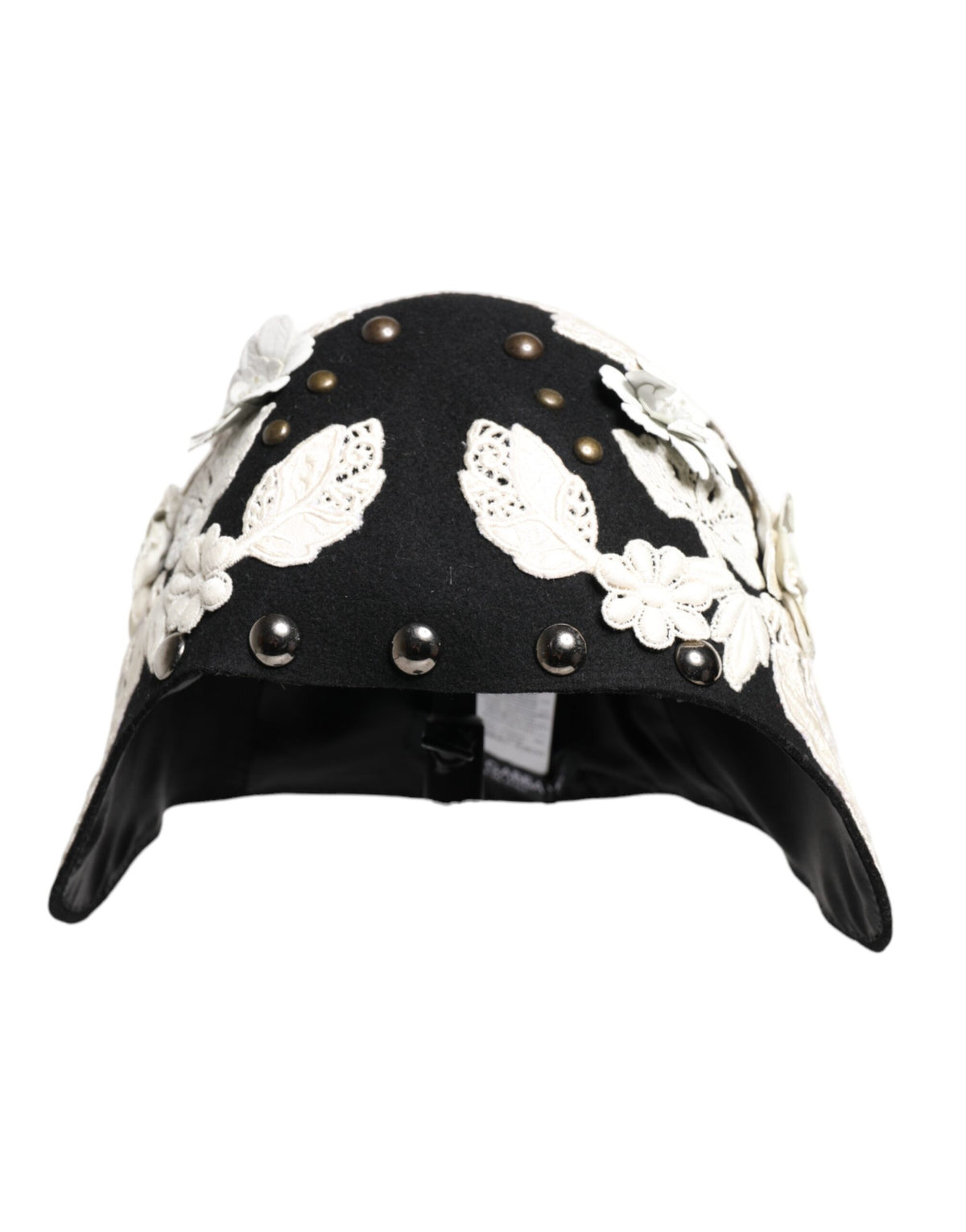 Chapeau cloche en laine noire avec motifs floraux blancs et feuilles d'or.