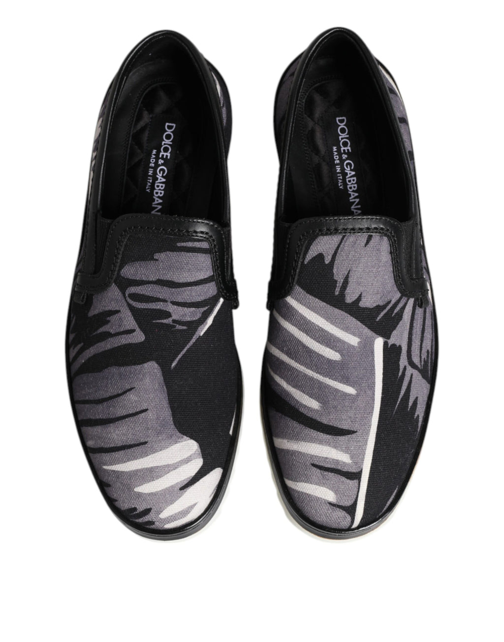 Sneakers homme noires à motif tropical, à enfiler.