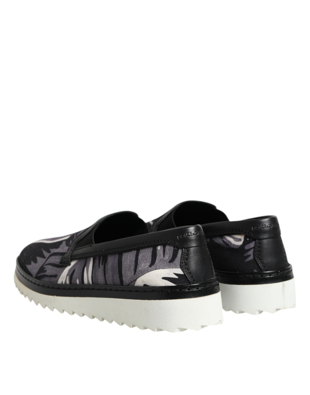 Sneakers homme noires à motif tropical, à enfiler.