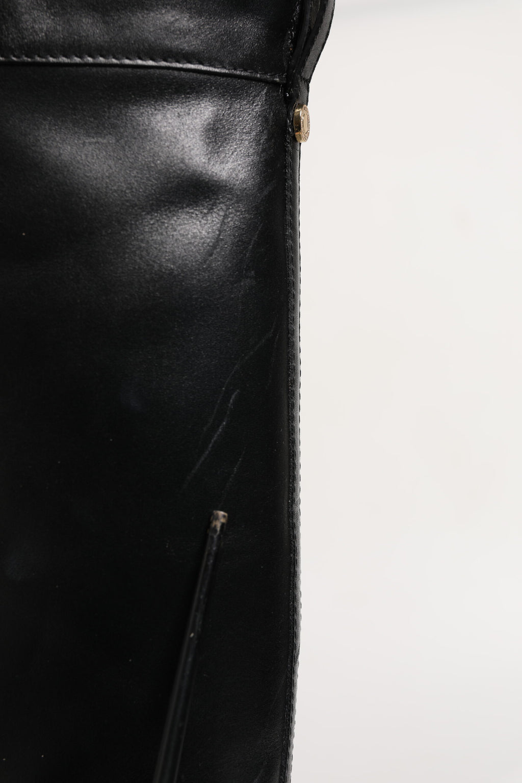 Bottines hautes en cuir noir avec boucle