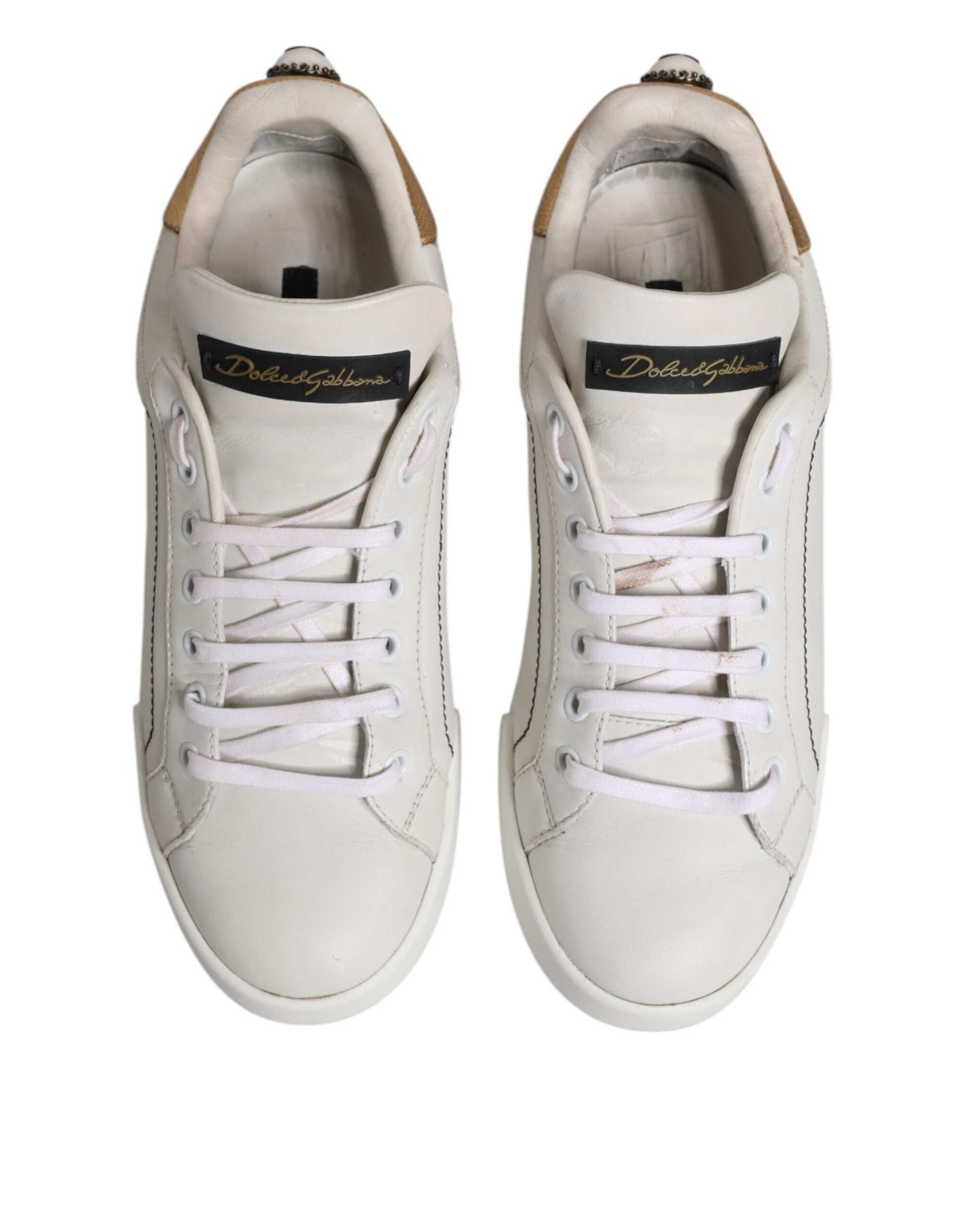 Sneakers basses en cuir blanc et or