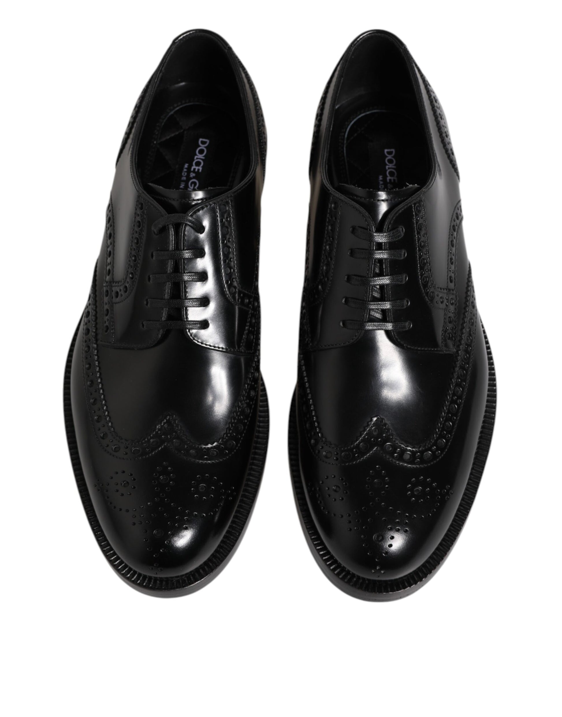 Chaussures habillées en cuir noir, style derby à bout pointu.