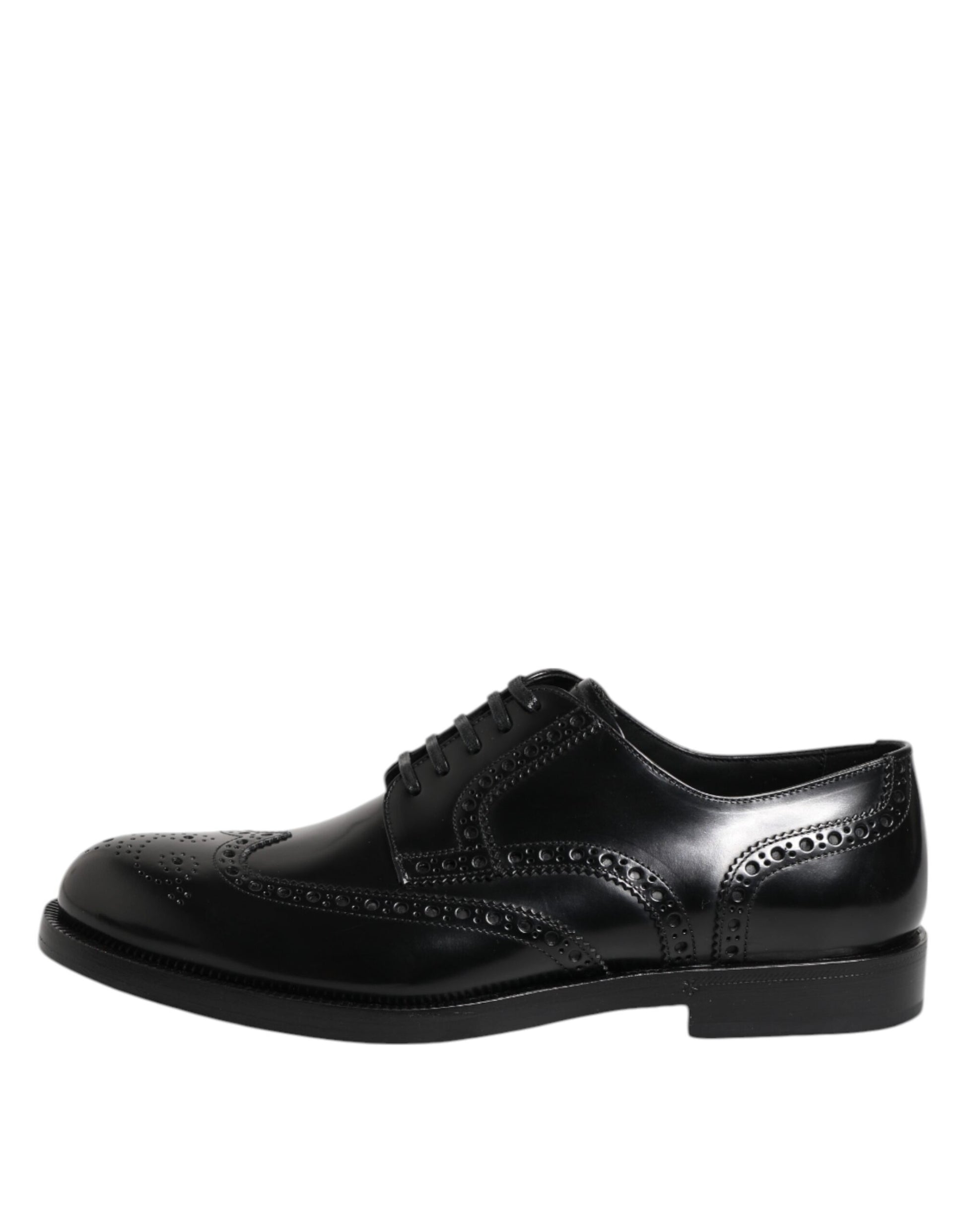 Chaussures habillées en cuir noir, style derby à bout pointu.
